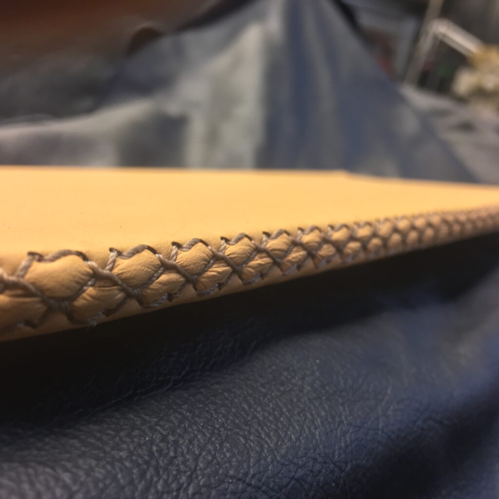 Hand stitched leather sun visor